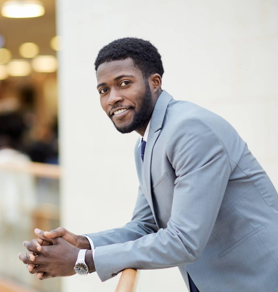 Isaac Vorsah smiling and pointing